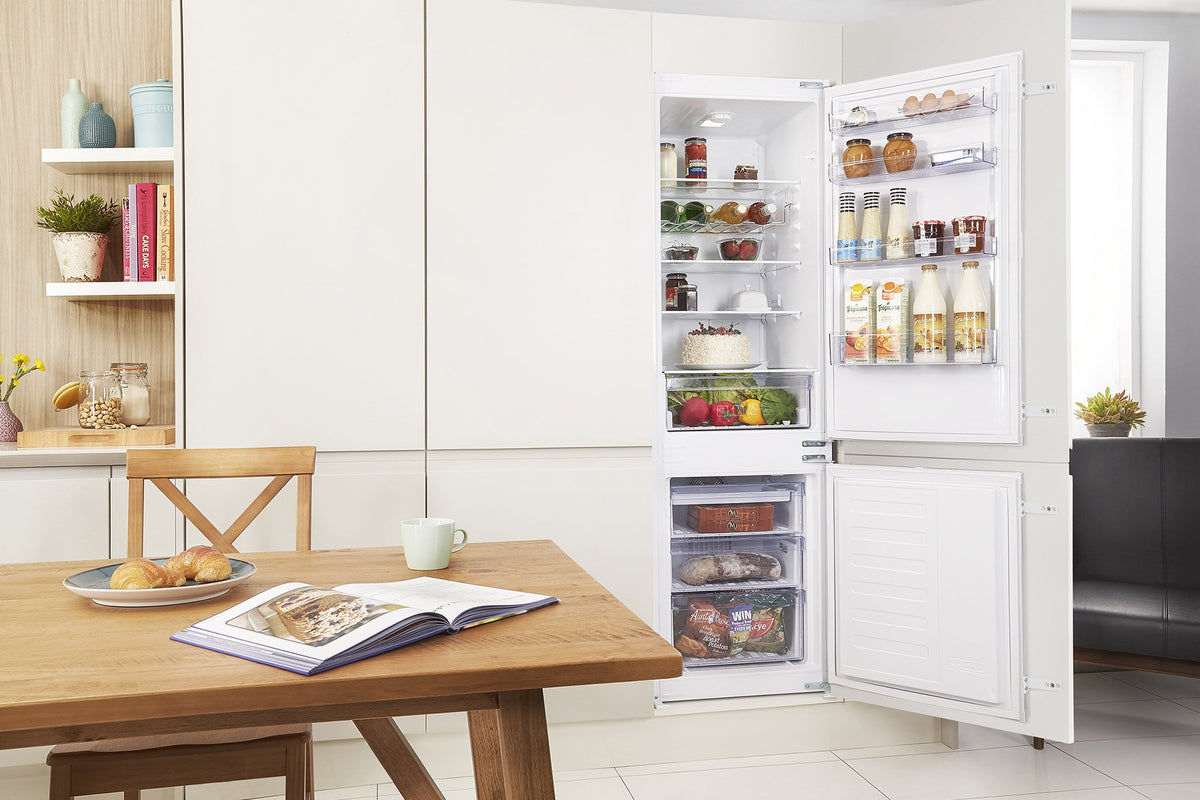 Integrated fridge freezers
