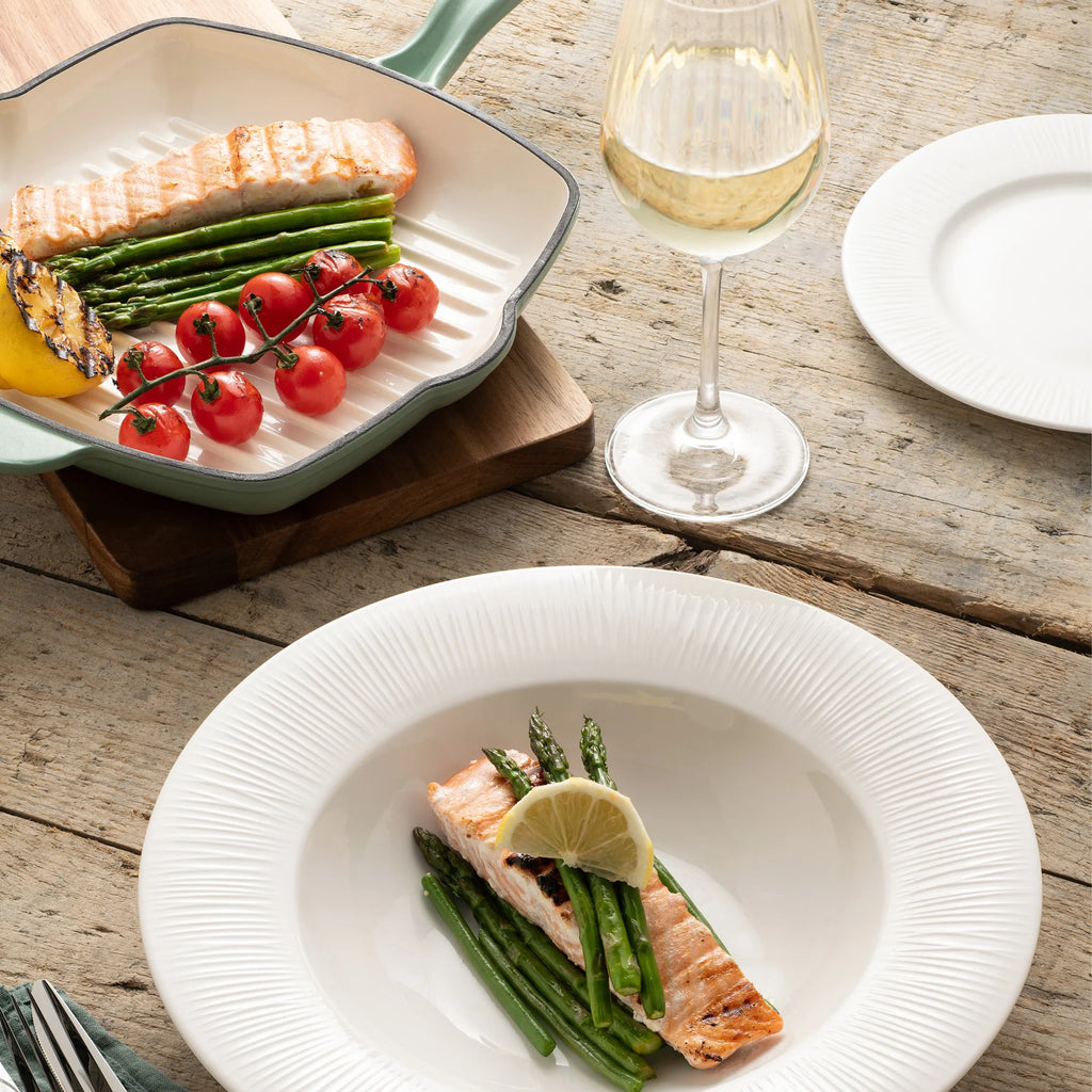 Belleek 9305 Erne Gourmet Dish Set of 2 - erne gourmet dish pictured with food servings and other tableware pieces on a wooden table