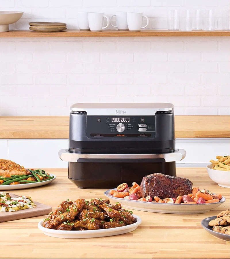 Ninja Dual Zone Air Fryer with cooked chicken and lamb