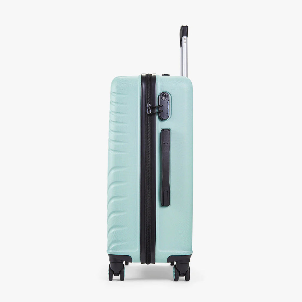 Rock TR0263GRNMED Santiago Medium Suitcase Mint Green - side of suitcase in an upright position