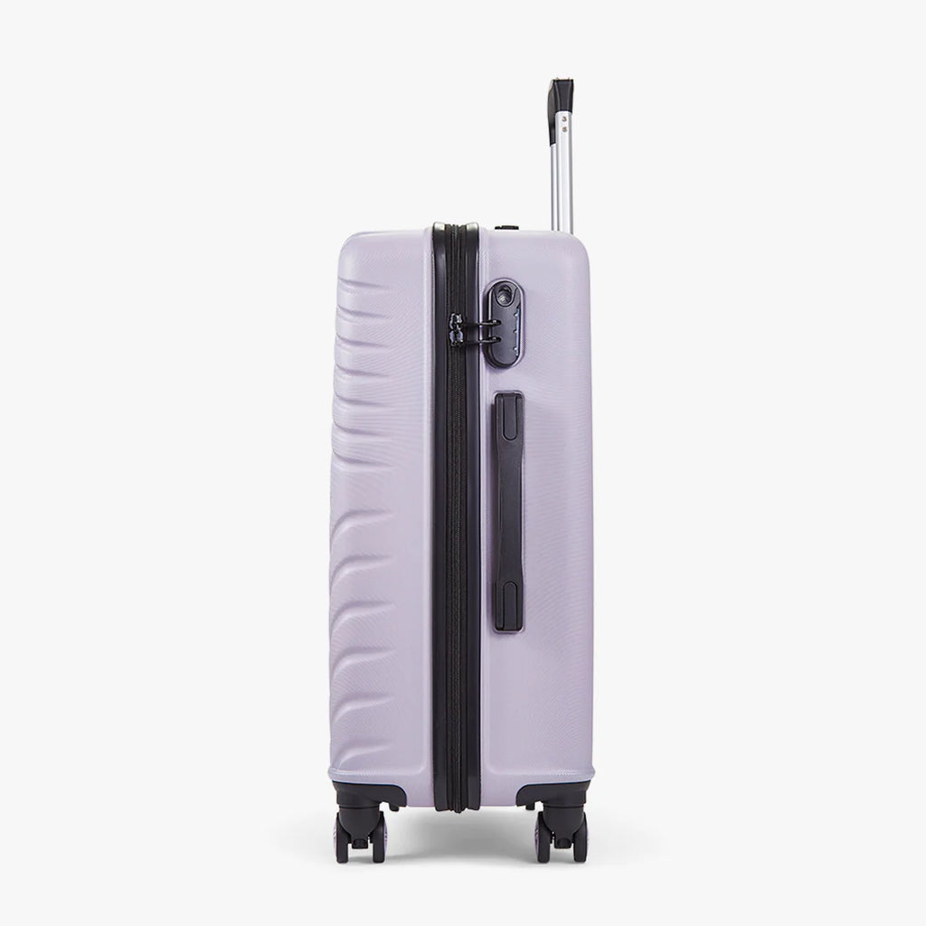 Rock TR0263PUMED Santiago Medium Suitcase Purple - side of suitcase in an upright position.