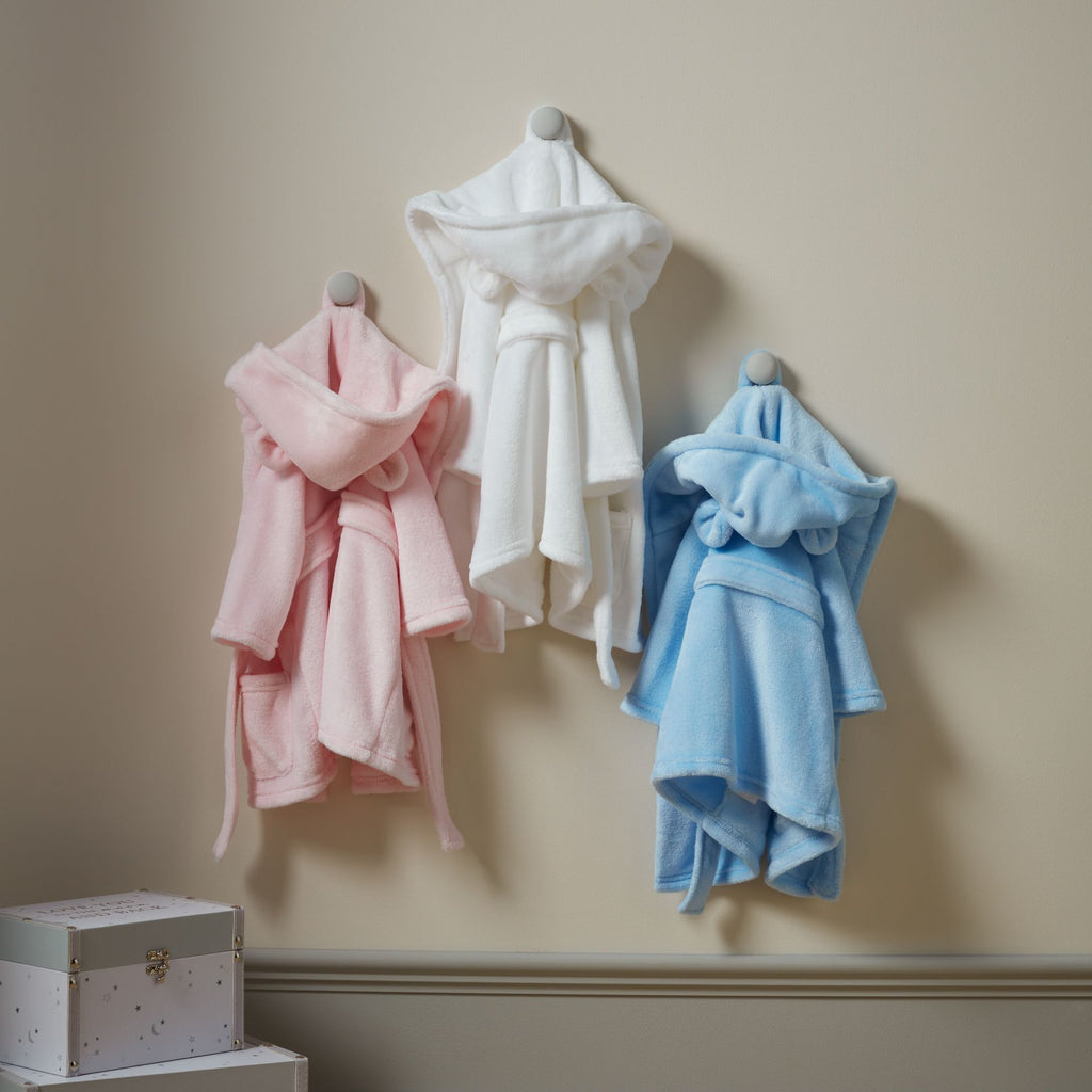 CG1682P Bambino Babys Dressing Gown Pink 3-6 Months - all 3 colours of the dressing gown pictured hanging on hooks