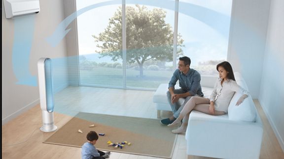 Family sitting in front of Dyson Cooling Tower