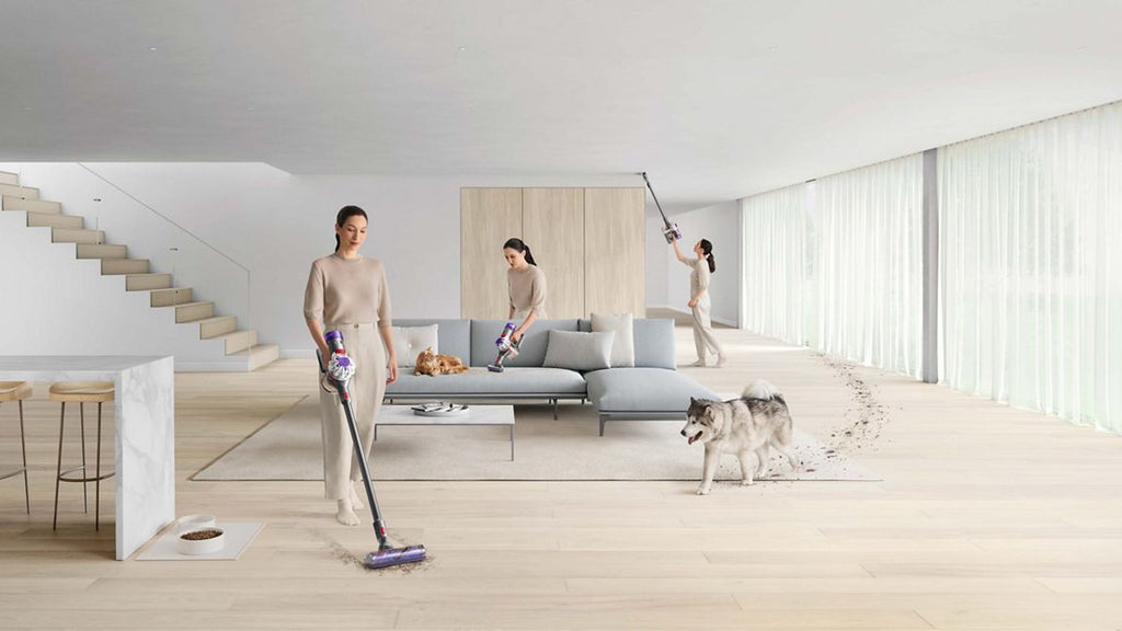 Woman using Dyson V8 Vacuum Cleaner