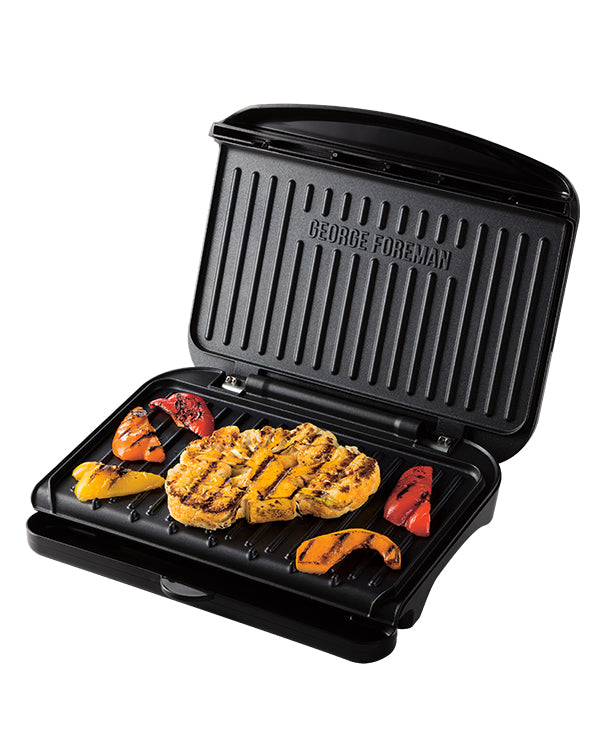 George Foreman Medium Grill in use