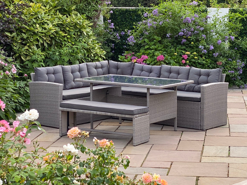 Amsterdam MNK405GY Casual Dining Set Grey - pictured in a garden with flowers