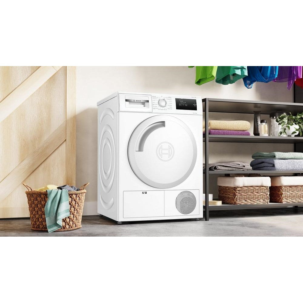 Bosch WTH84001GB 8kg Heat Pump Condenser Dryer - front view of appliance pictured in a home setting