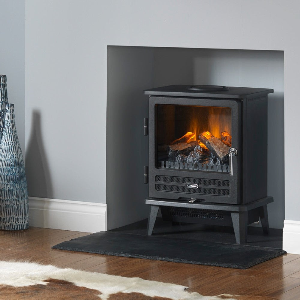 Dimplex WLL20 Willowbrook Optimyst Stove - electric stove pictured with flame effect on, placed in a house interior