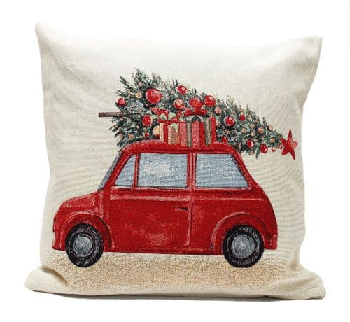 White cushion with Red car on it with Christmas tree on top