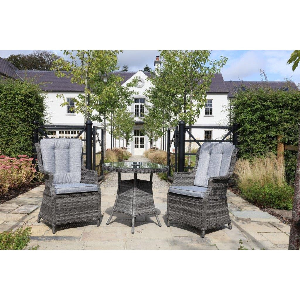 Florence MJT619 Bistro Set Dark Grey - set placed in a garden outside a country house
