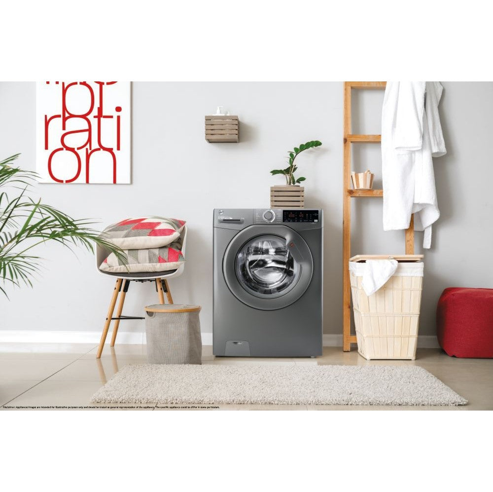 Hoover H3W49TAGG4 9kg-1400 Spin Speed Graphite Washing Machine - the Hoover washing machine pictured in a furnished home interior