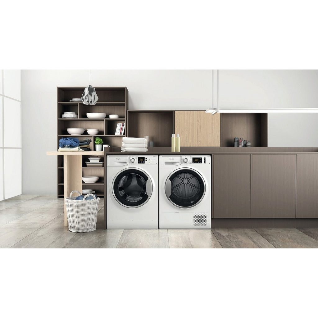 Hotpoint NSWE846WSUK 8kg-1400 Spin Speed Washing Machine - a different view of the front of the washing machine pictured in a furnished home interior