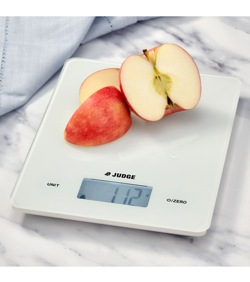 Judge J419 5kg Digital Scale Touch Control with a cut apple on the scale