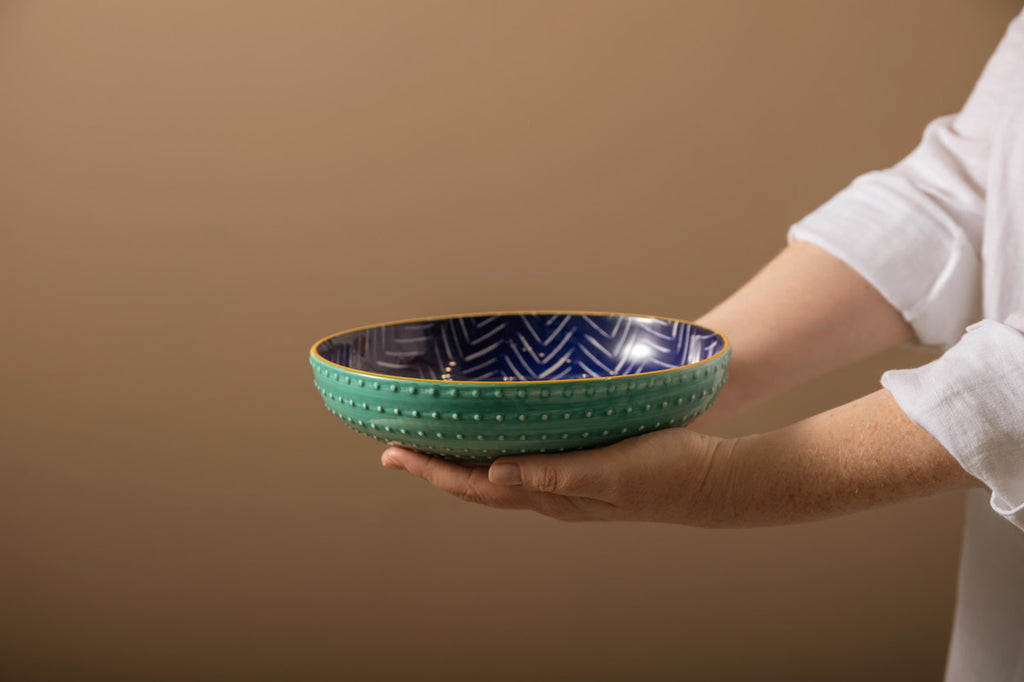 Woman holding Mikasa Indigo Chevron Stoneware Bowl, 21cm