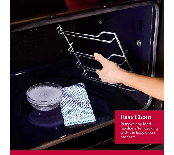 Woman removing grill inside the oven-Easy Clean