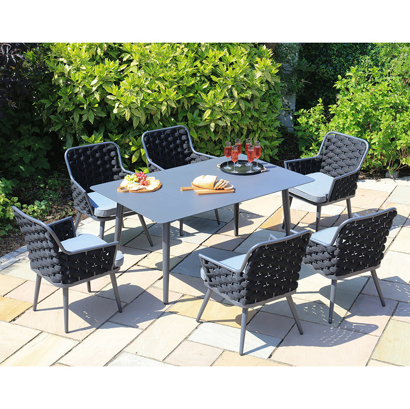 Porto MJT301 6 Seat Garden Set - set placed outdoors in a garden with a platter and cold drinks served