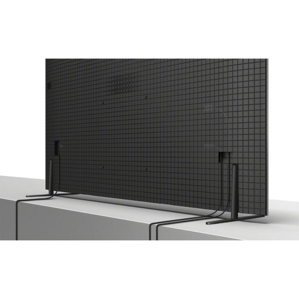 Sony K55XR80PU 55" 4K OLED TV - view of the television from the back with the cables attached on a white table