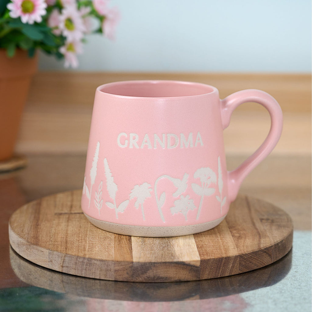 TC169GM The Cottage Garden Floral Mug Pink " Grandma" - mug placed on a coaster set on top of a table