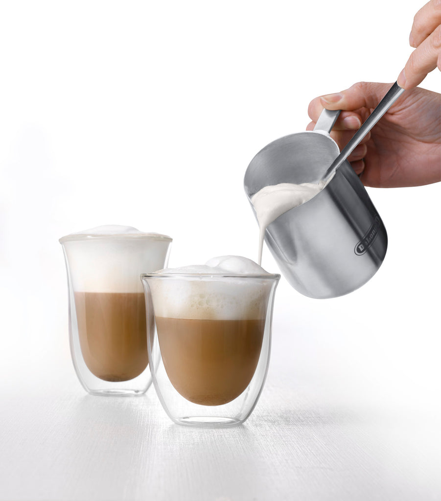 Coffee cups with froth milk