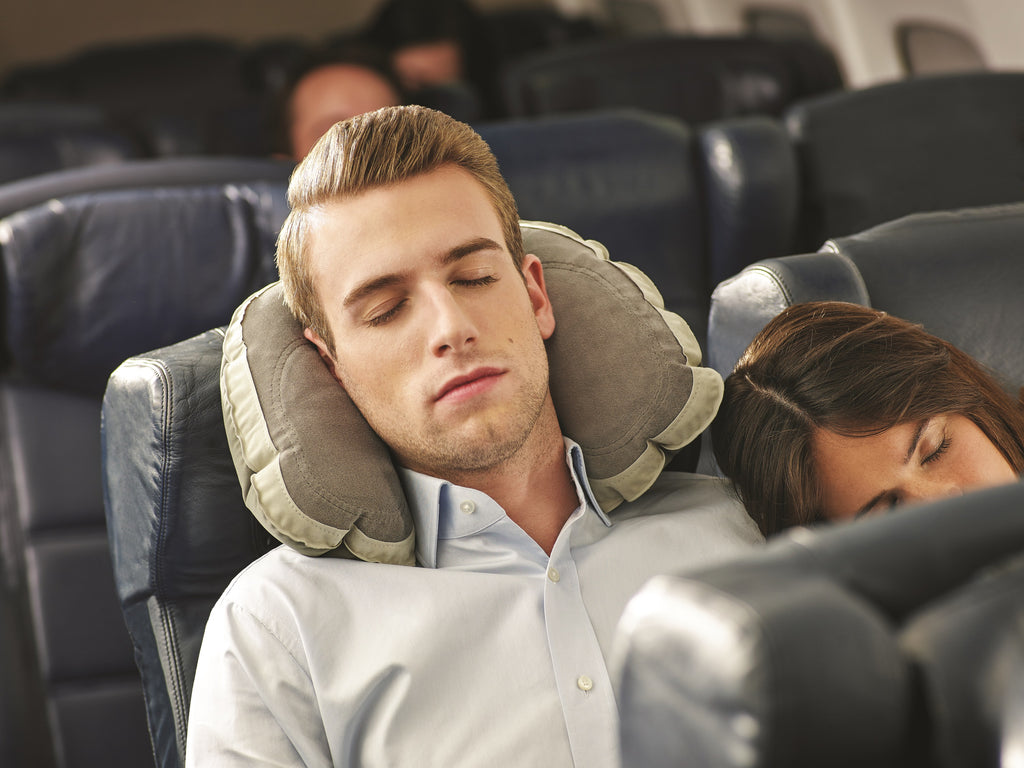 Man using Super Snoozer Travel Pillow