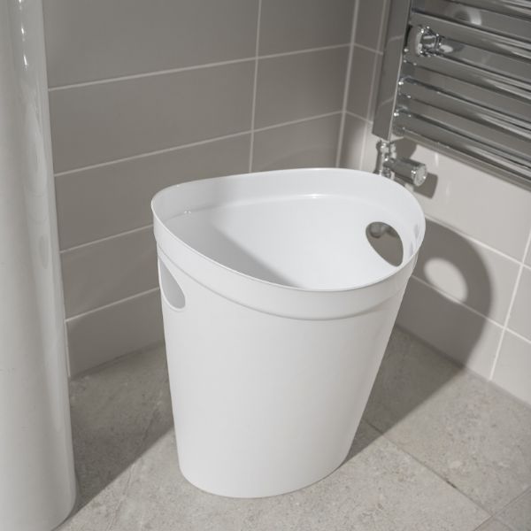 Addis 515212 Flexi Bin White sitting beside the radiator in the bathroom