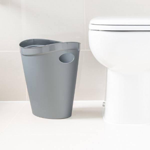 Addis 518077 Flexi Bin Metallic sitting beside the toilet in the bathroom