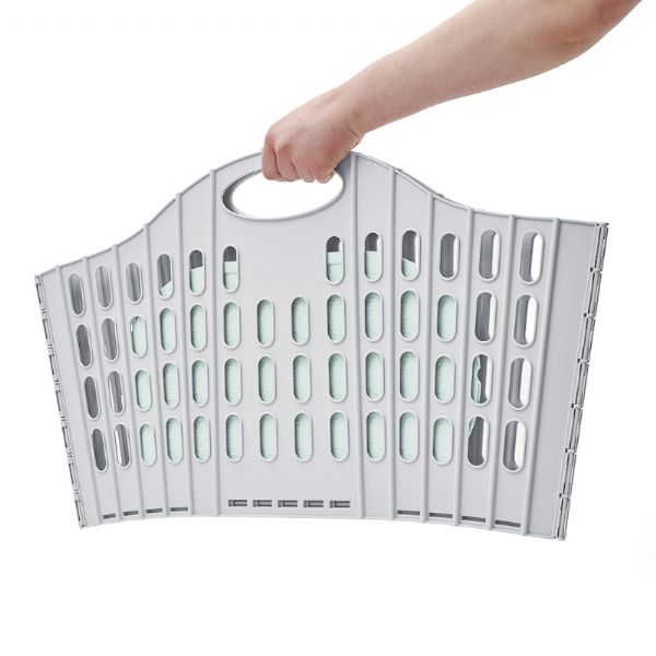 Addis 518163 Fold Flat Laundry Basket Green & Grey folded flat in someone's hand
