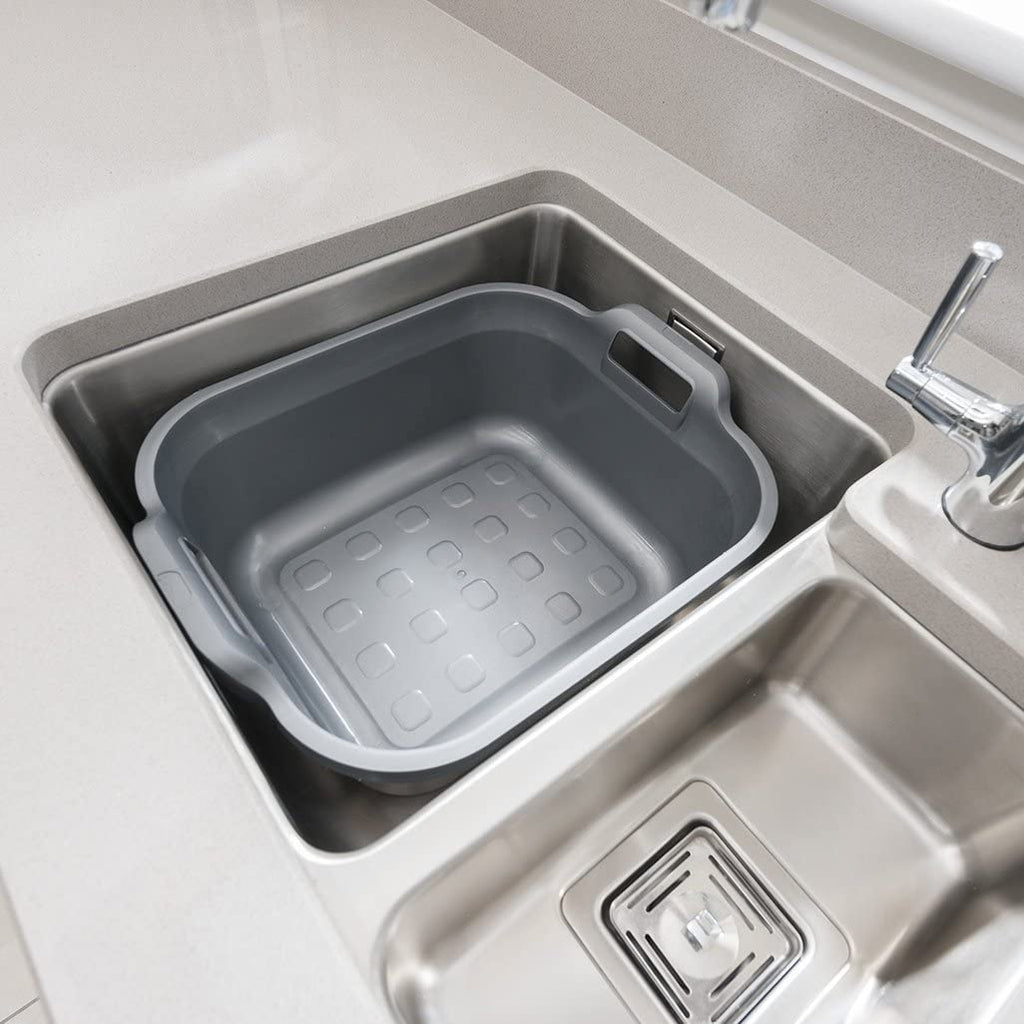Addis Sink Bowl 517935 10L Twin Handle Rectangular - Metallic showing it sitting inside the sink