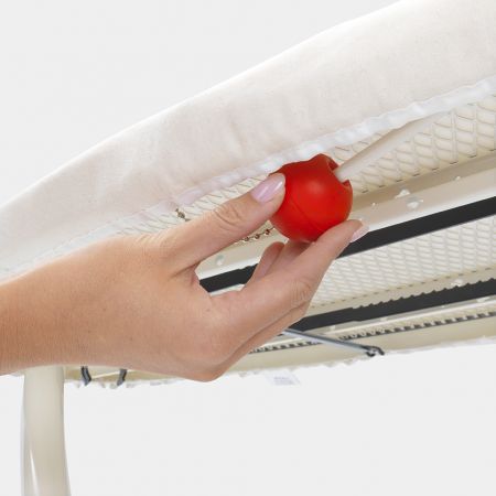 hand holding ironing board lock