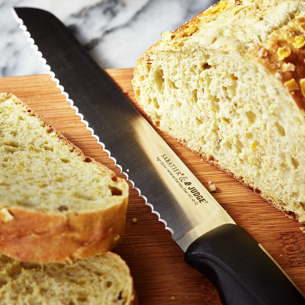 Judge knife cutting bread