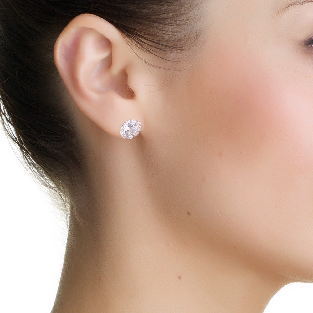 Woman wearing Newbridge Flower Earrings Clear Stones