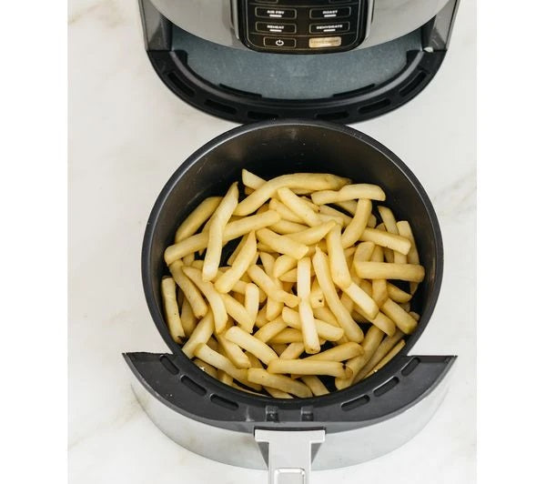 Ninja Air Fryer basket showing open and has chips in it